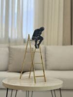 Thinking Man on Stairs