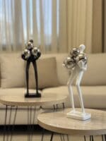 Abstract Figure with Silver Balls